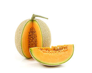 Cantaloupe melon med orange frugtkød og netmønstret skal
