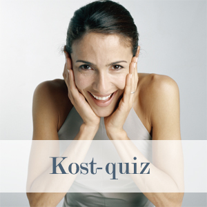 Kvinde med grøntsager som illustration til kostquiz om mad og sundhed